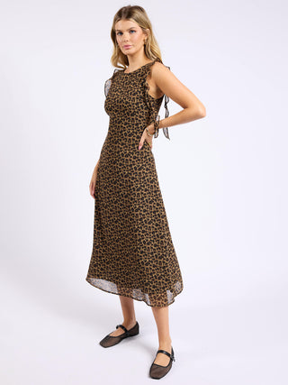 a flirty brown and black leopard print maxi dress with a flattering silhouette