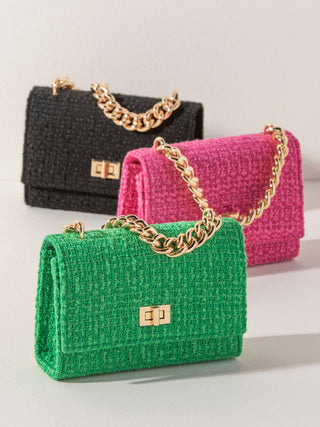 petite and rectangular frame handbag in fun colors with textured boucle fabric