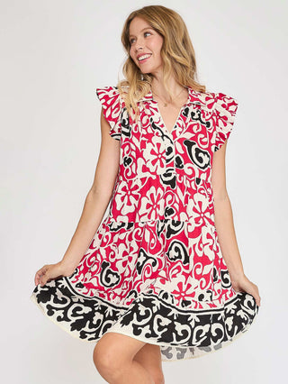 a mini red and black border print dress