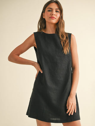 black linen sleeveless mini dress with buttons up the side 