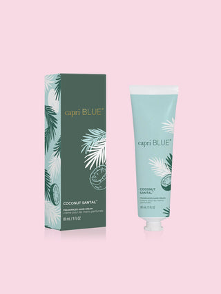 a sleek travel bottle of capri blue coconut santal hand cream