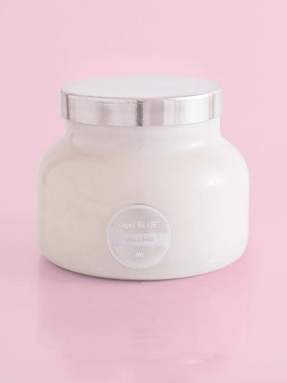 a white ceramic tropical punch scented candle in a large chic jar