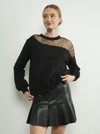 a charming black crewneck sweatshirt with an asymmetric mesh shoulder design