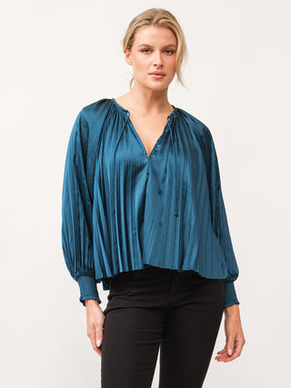 a shimmering and elegant deep teal satin blouse