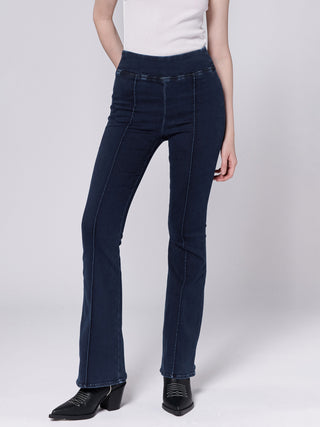 a pair of mid rise dark wash denim jeans with a stretchy waist and flexible fit