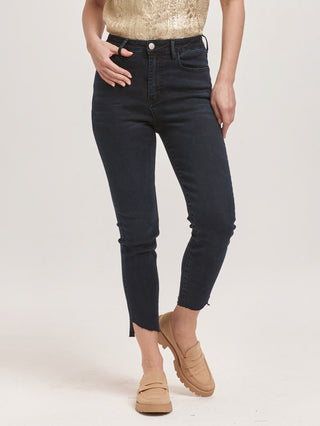 black high rise slim fit jeans with a asymmetrical raw cut cropped hem