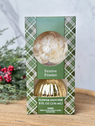 a festive holiday flower diffuser with scents of fir needles and cedar wood 