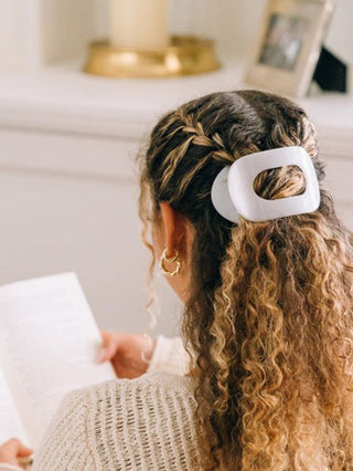 white teleties hair clip used to hold hair up and add style