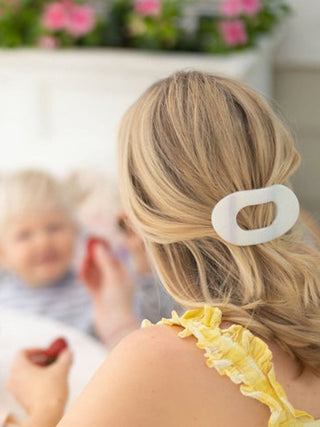 pearl white teleties hair clip used to hold hair up and add style