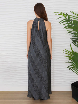 a flattering black and grey snake print maxi dress with a halter mock neck and buttoned back