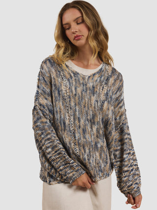 a comfy and relaxed multi colored navy v neck sweater with long sleeves