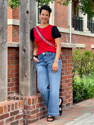 a stylish georgia red and black game day top with balloon sleeves and shirring detail