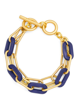 a stylish 18k gold plated toggle bracelet with navy marbled resin