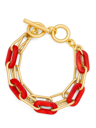 a stylish 18k gold plated toggle bracelet with red marbled resin