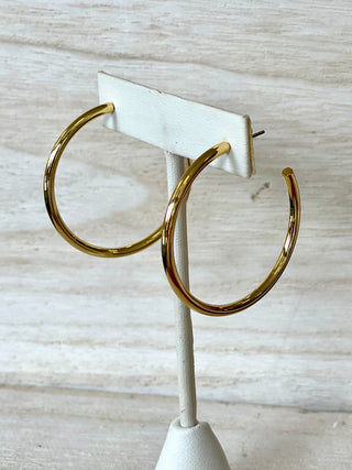 simple metallic gold hoop earrings with 18k plated gold