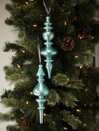 a blue northern sky christmas tree ornament in a statement shapes perfect for holiday home decor and hostess gifts