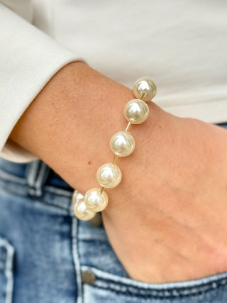 white pearl beaded bracelet with gold bar spacers