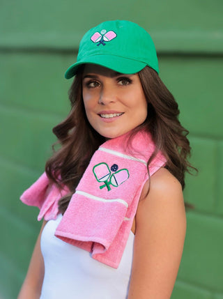green baseball hat with pink embroidered paddles for pickleball lovers