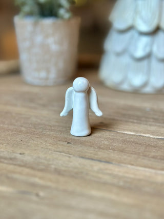 a white petit ceramic pocket angel gift