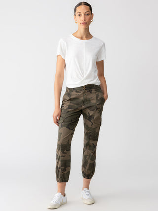 green and brown camouflage cargo pants with basic white tshirt