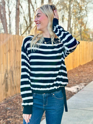 a soft chic cropped black and white striped sweater