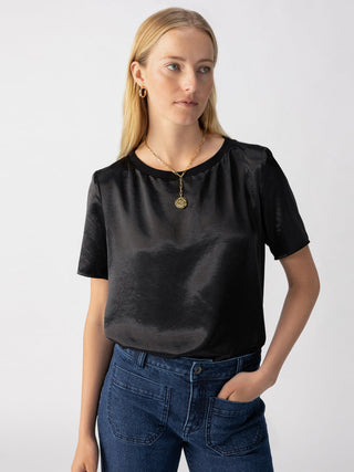 a classic yet flattering black satin short sleeve tee