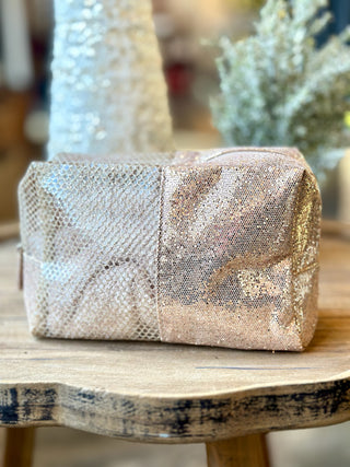 a sparkling light gold cosmetic and makeup bag