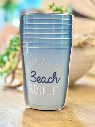 plastic party cups in blue that say party at the beach house
