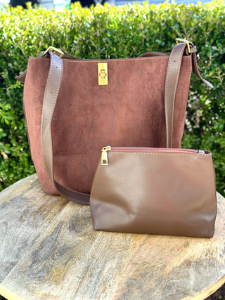 a stylish coffee brown faux suede bucket bag with a matching cosmetic bag