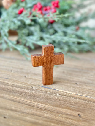 a small wooden pocket cross