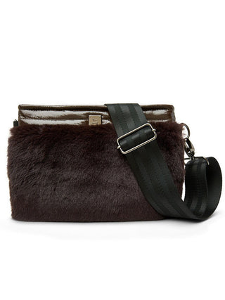 a chocolate brown reversible shiny quilted and faux fur crossbody bag