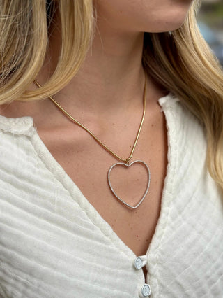 large open cz silver hearts on a sleek gold round snake chain necklace