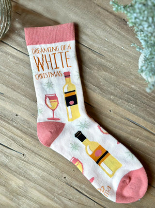 pink and white holiday socks with a white wine pattern