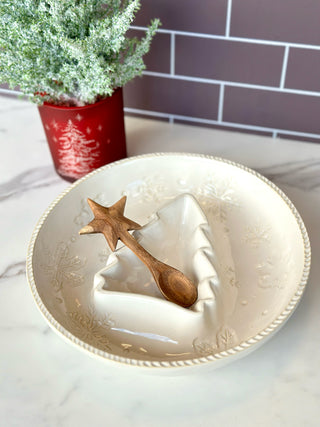 a holiday chip and dip set with a ceramic snack christmas tree bowl and wooden star spoon