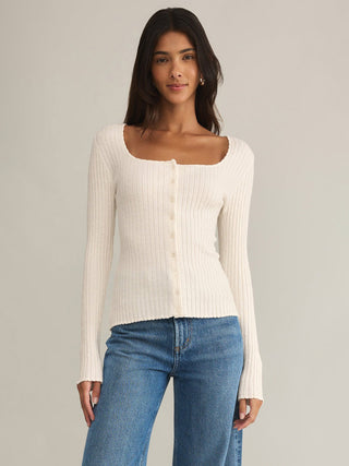 a cream square neck long sleeve button up sweater